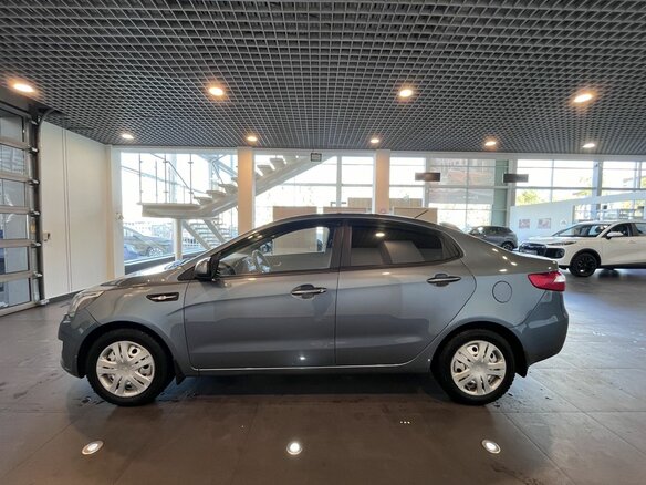 2013 Kia Rio III, голубой - вид 5