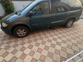 2003 Dodge Caravan IV, серый - вид 3