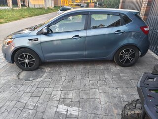 2012 Kia Rio 5-speed III, голубой, 519000 рублей, вид 2