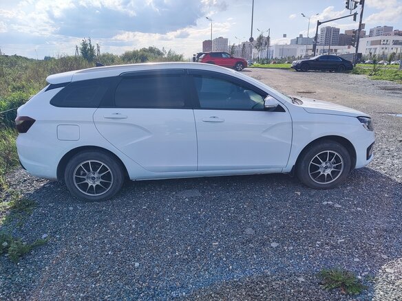 2023 Lada (ВАЗ) Vesta SW I Рестайлинг (NG), белый - вид 1