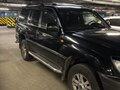 2003 Lexus LX 470 II Рестайлинг, чёрный - вид 4