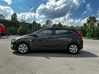 2016 Hyundai Solaris I Рестайлинг, коричневый, 1375000 рублей, вид 4