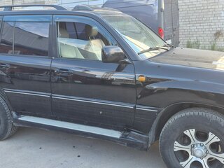 2003 Toyota Land Cruiser 100 Series Рестайлинг 1, чёрный, 1600000 рублей, вид 4