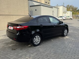 2013 Kia Rio 4-speed III, чёрный, 830000 рублей, вид 5