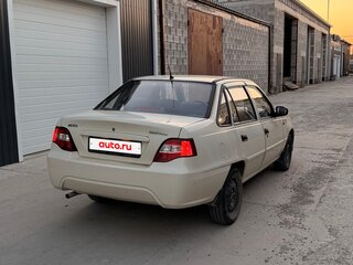 2012 Daewoo Nexia I Рестайлинг, белый, 290000 рублей, вид 3