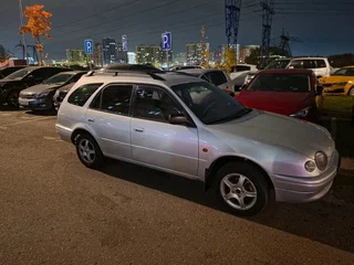 1999 Toyota Corolla VIII (E110), серебристый, 245000 рублей, вид 4