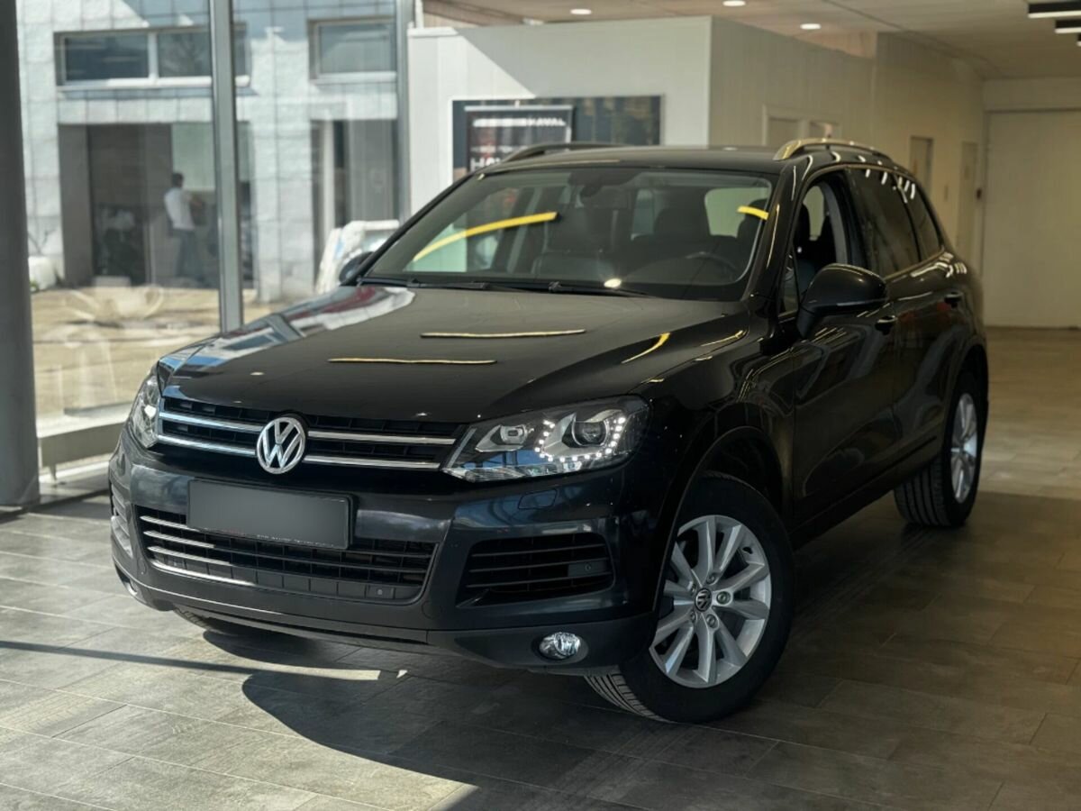 Открыть фотографии: Volkswagen Touareg II