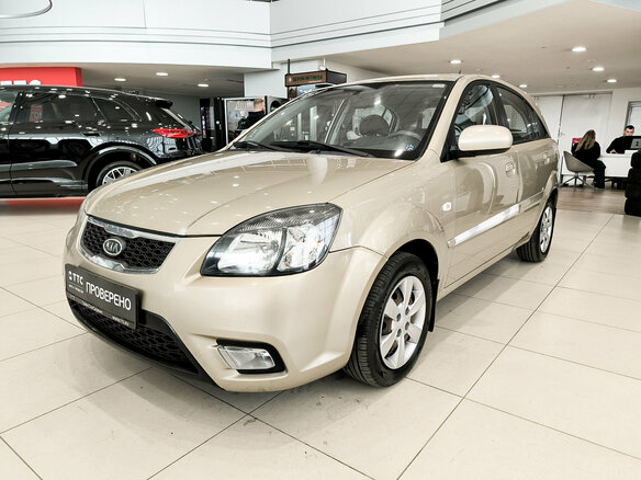 2011 Kia Rio II Рестайлинг, бежевый, 430000 рублей