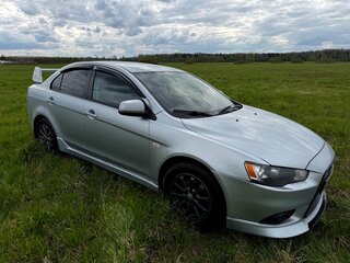 2012 Mitsubishi Lancer X Рестайлинг, серебристый, 650000 рублей, вид 1