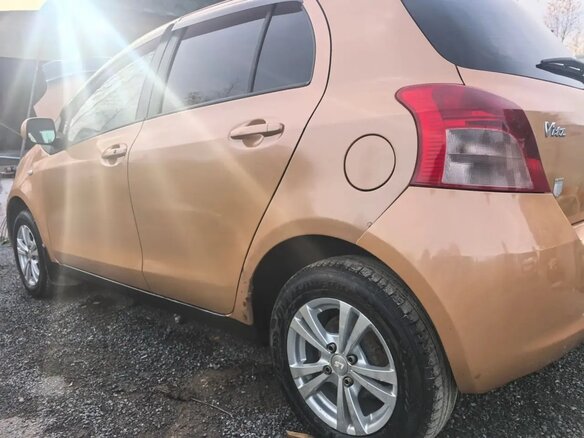 2005 Toyota Vitz II (XP90), оранжевый, 510000 рублей - вид 9