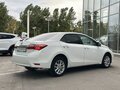 2013 Toyota Corolla XI (E160, E170, E180), белый - вид 4