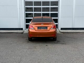 2015 Hyundai Solaris I Рестайлинг, оранжевый, 850000 рублей, вид 4