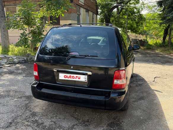 2005 Kia Carnival I Рестайлинг, чёрный - вид 1