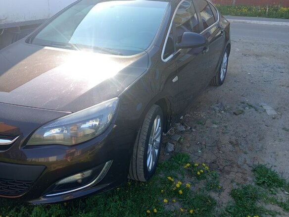 2013 Opel Astra J Рестайлинг, коричневый, 670000 рублей