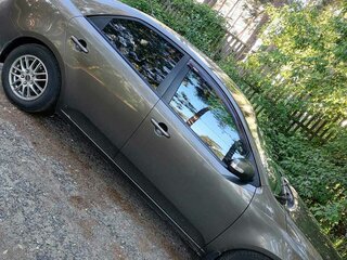 2009 Kia Cerato 4-speed II, коричневый, 750000 рублей, вид 2