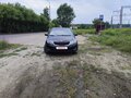 2015 Kia Rio III Рестайлинг, чёрный, 700000 рублей - вид 2