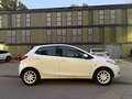 2009 Mazda 2 II (DE), белый - вид 2