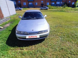 1993 Toyota Sprinter Marino, серебристый, 225500 рублей, вид 1