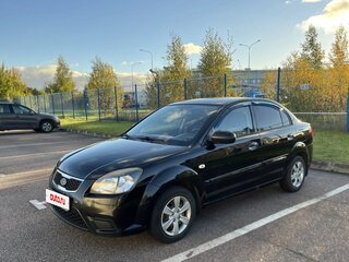 2010 Kia Rio II Рестайлинг, чёрный, 650000 рублей, вид 1