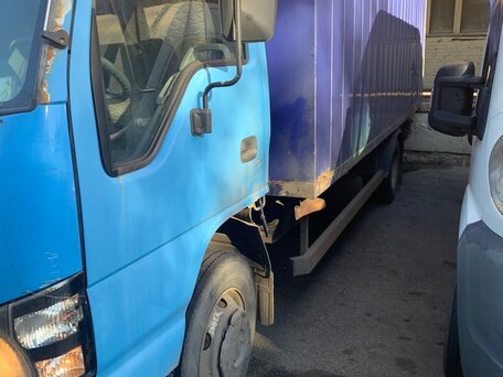 2009 Isuzu Elf (N-series), синий, 1000000 рублей, вид 5