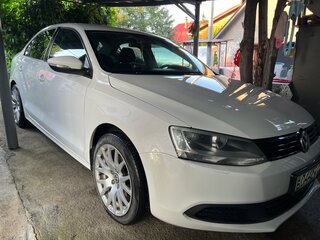 2011 Volkswagen Jetta VI, белый, 750000 рублей, вид 2