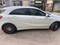 2014 Mercedes-Benz A-Класс 180 III (W176), белый - вид 2