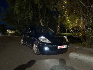 2010 Nissan Tiida I Рестайлинг, чёрный, 900000 рублей, вид 1