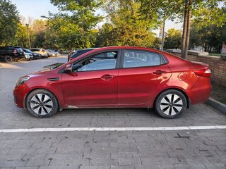 2012 Kia Rio 4-speed III, красный, 850000 рублей, вид 3