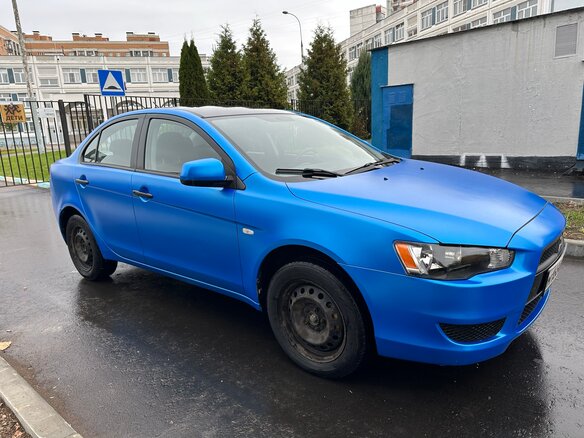 2010 Mitsubishi Lancer X, синий - вид 4