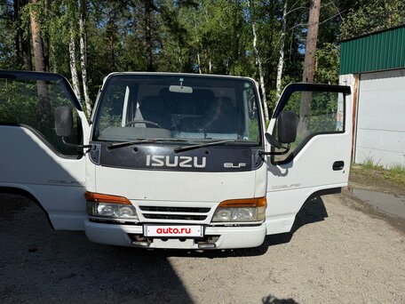 1995 Isuzu Elf (N-series), белый, 1700000 рублей, вид 4