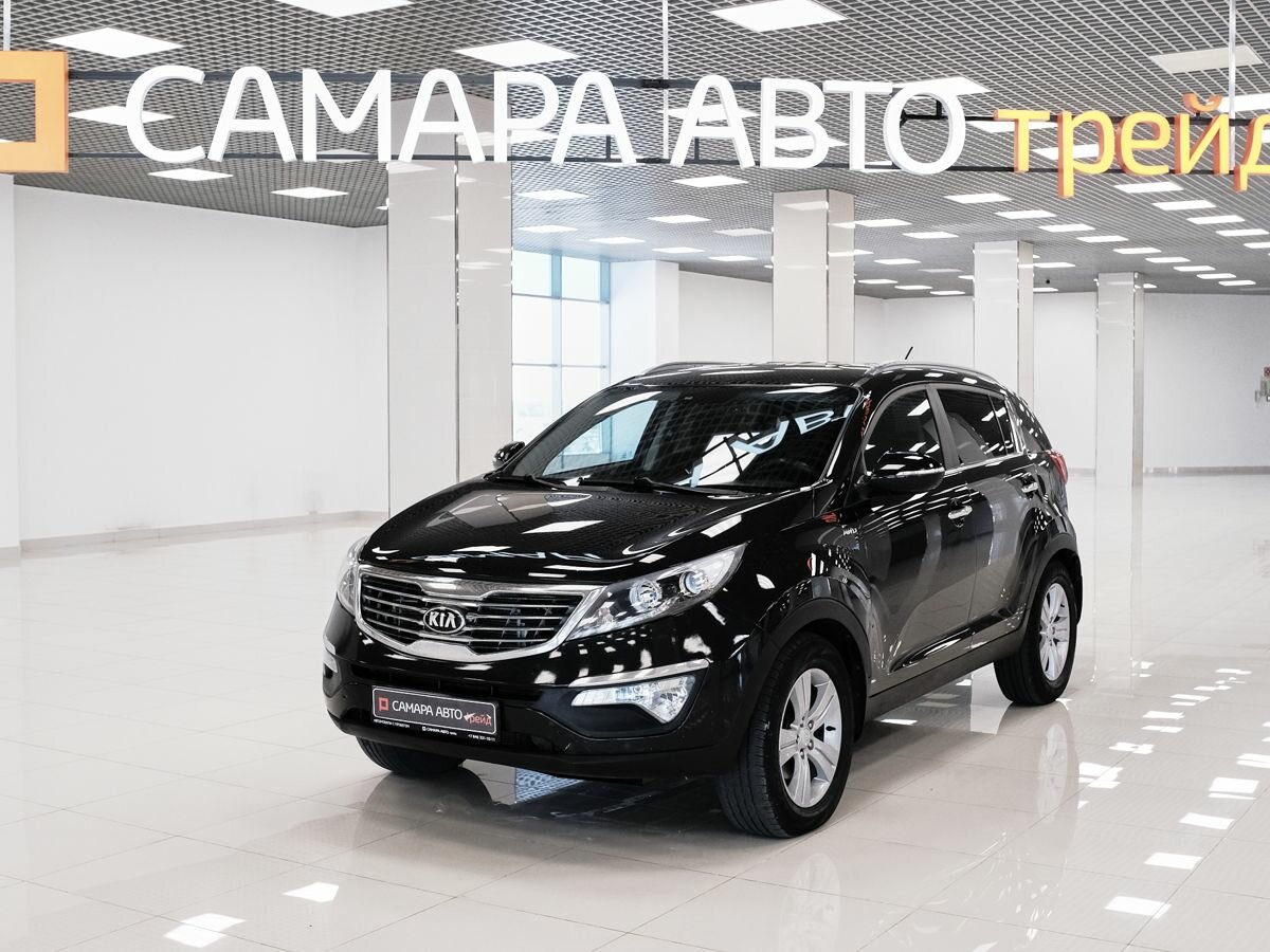 Открыть фотографии: Kia Sportage III