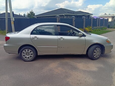 2004 Toyota Corolla IX (E120, E130) Рестайлинг, серебристый, 350000 рублей, вид 2
