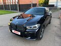 2022 BMW X6 40d III (G06), чёрный, 6550000 рублей