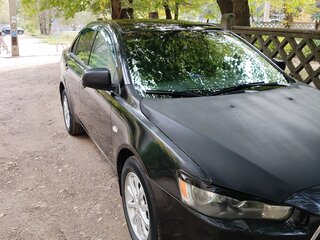 2014 Mitsubishi Lancer X Рестайлинг, чёрный, 650000 рублей, вид 1