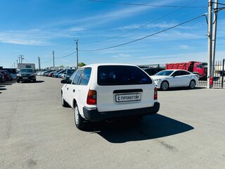 1999 Toyota Corolla VII (E100), белый, 349999 рублей, вид 4