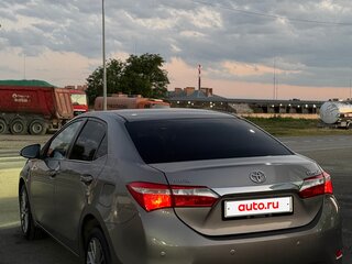 2013 Toyota Corolla XI (E160, E170, E180), коричневый, 1150000 рублей, вид 5