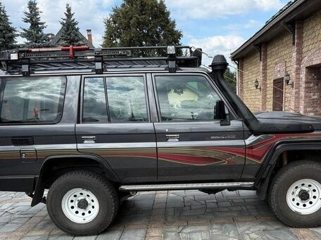 2009 Toyota Land Cruiser 76 70 Series Рестайлинг 1, чёрный, 7500000 рублей, вид 3