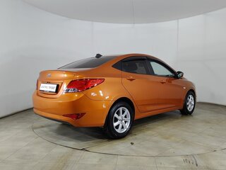 2016 Hyundai Solaris I Рестайлинг, жёлтый, 910000 рублей, вид 5