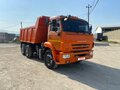 2022 КамАЗ 65115, оранжевый