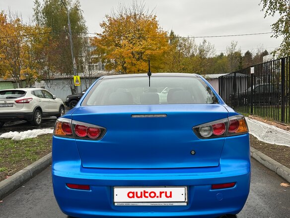 2010 Mitsubishi Lancer X, синий - вид 5