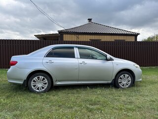 2009 Toyota Corolla X (E140, E150), серебристый, 950000 рублей, вид 3