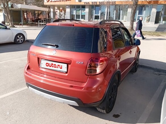 2011 Suzuki SX4 I (Classic) Рестайлинг, оранжевый, 750000 рублей - вид 5