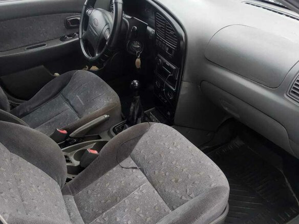 2006 Kia Spectra I Рестайлинг 2, пурпурный - вид 4
