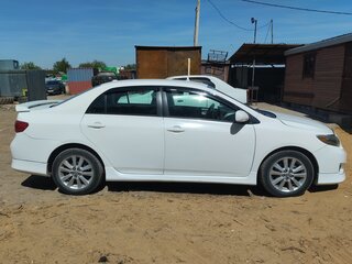 2010 Toyota Corolla X (E140, E150), белый, 1200000 рублей, вид 2