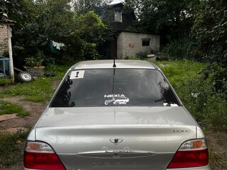 2006 Daewoo Nexia I, серебристый, 92000 рублей, вид 4