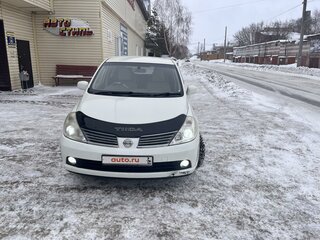 2006 Nissan Tiida I, белый, 570000 рублей, вид 2