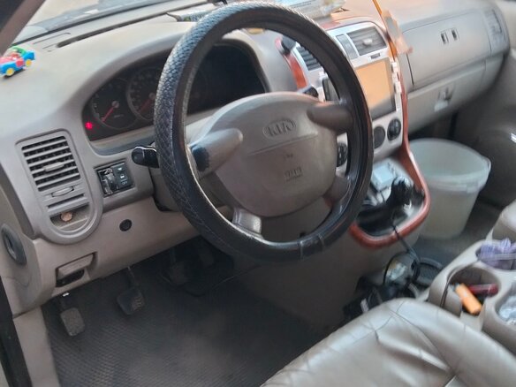 2004 Kia Carnival I Рестайлинг, зелёный, 580000 рублей - вид 4