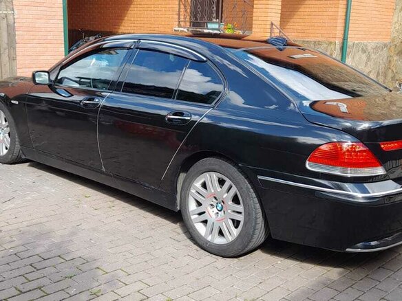 2004 BMW 7 серии 730d IV (E65/E66), чёрный, 1100000 рублей - вид 2