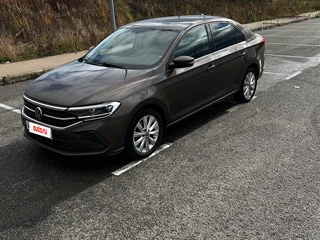 2020 Volkswagen Polo VI, коричневый, 1690000 рублей, вид 2