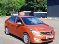 2014 Hyundai Solaris I Рестайлинг, оранжевый - вид 10